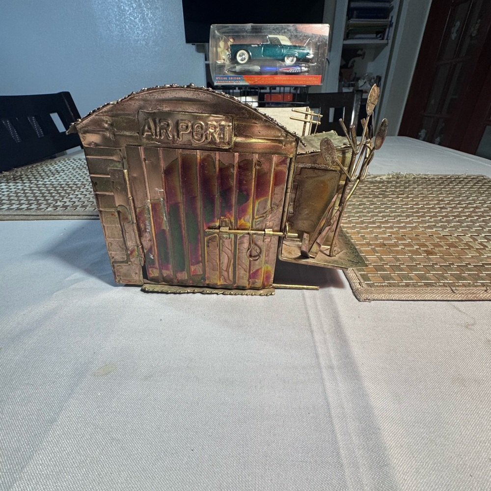 Vintage Metal Airport Sculpture – Musical Wind‑Up Airplane with Moving Hangar